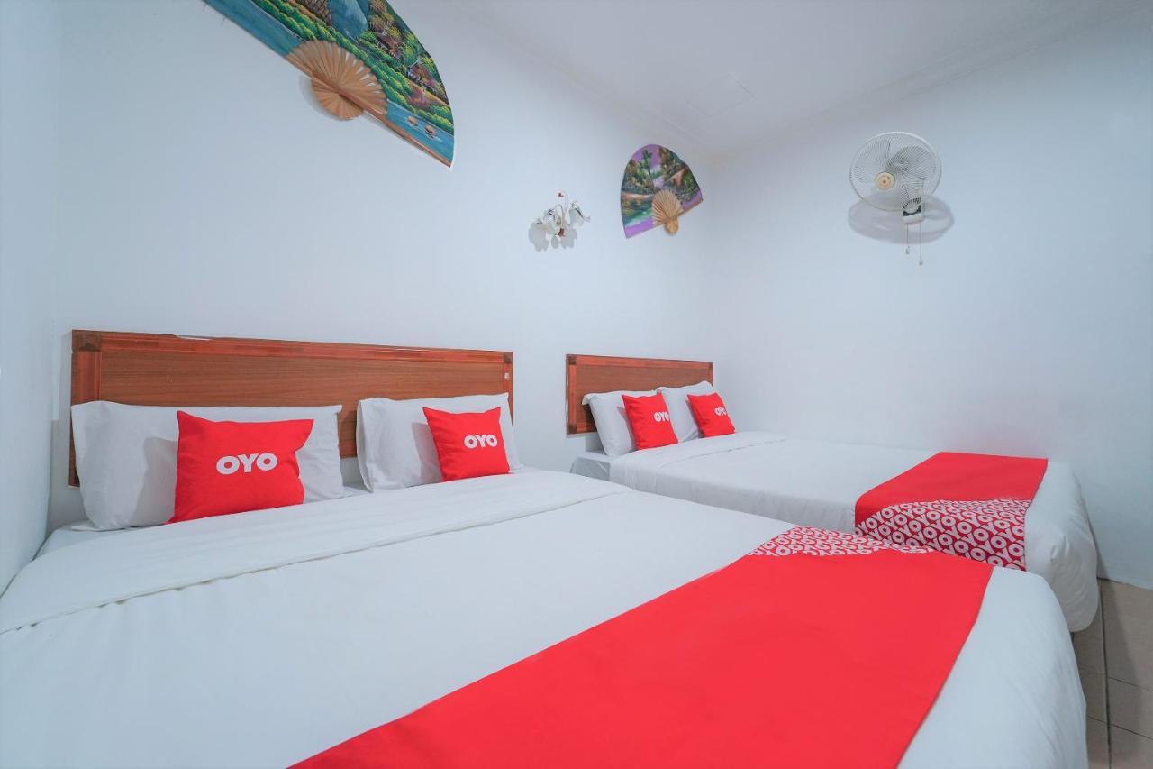 Oyo 89850 Mutiara Motel Kuah Extérieur photo